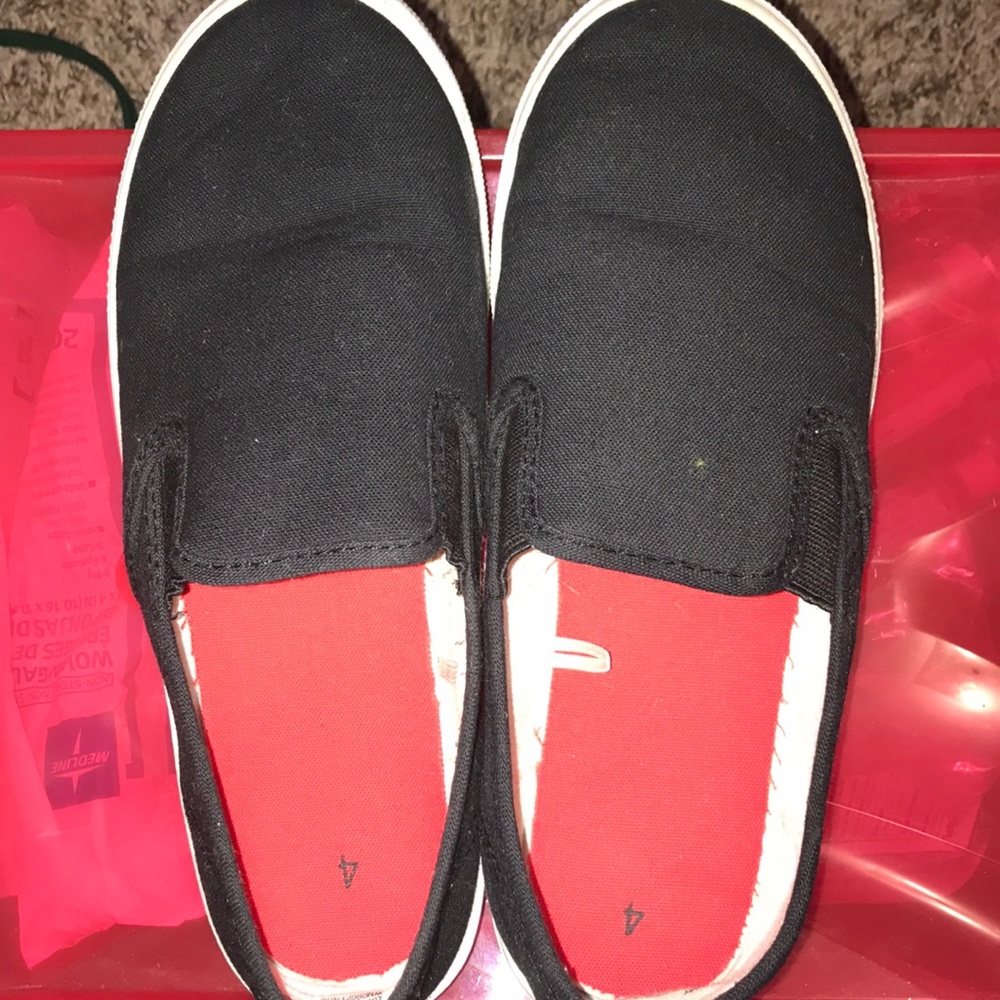 Slip on black and red shoes
